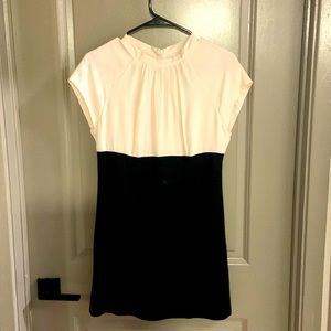 White top, black skirt dress